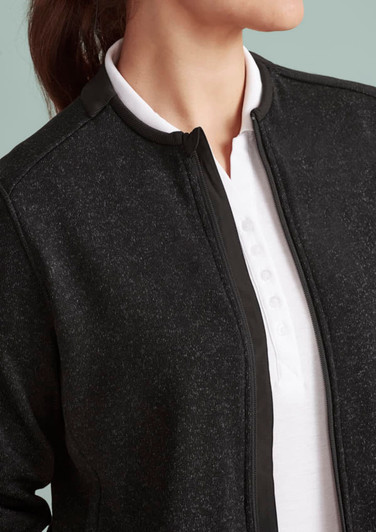 A zip-front jumper in black, featuring a high collar and a textured fabric design. It has a logo on the side.