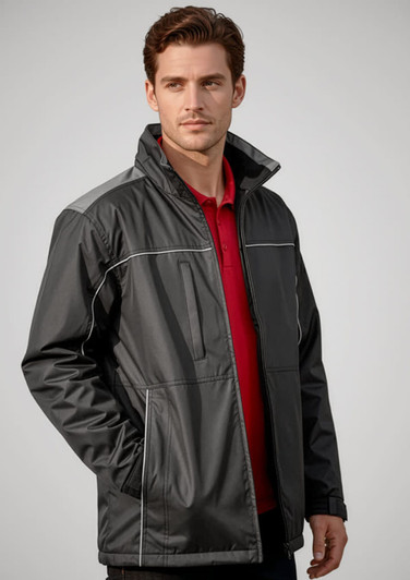 A man models a black unisex reactor jacket with grey accents, featuring zip pockets and a collar.