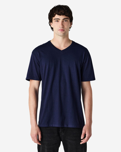 A navy adult v-neck t-shirt displayed on a male model, featuring a subtle logo.