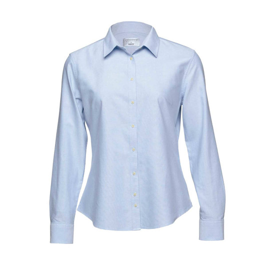 A light blue women's button-up shirt with long sleeves and a collar. The shirt has a branding logo.
