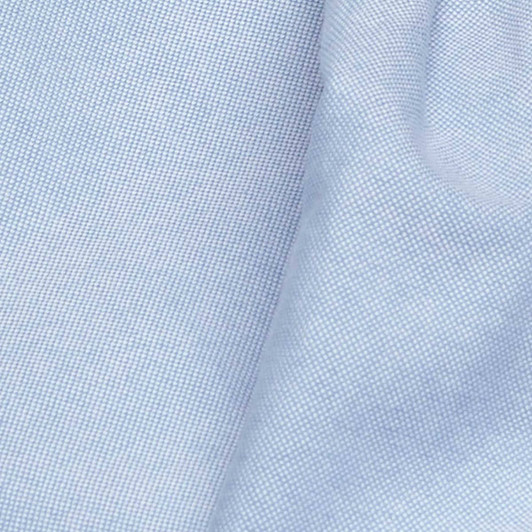 Light blue button-up shirt fabric with a textured pattern and a small logo.