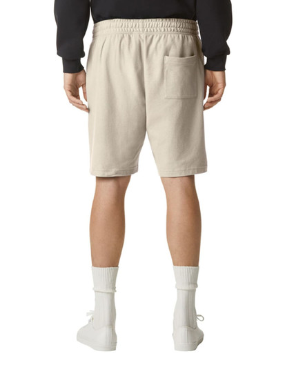 Beige unisex pique gym shorts featuring an elastic waistband and a single back pocket.