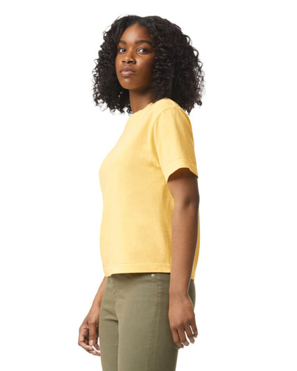 A yellow heavyweight boxy T-shirt displayed on a model, featuring a crew neckline and short sleeves.