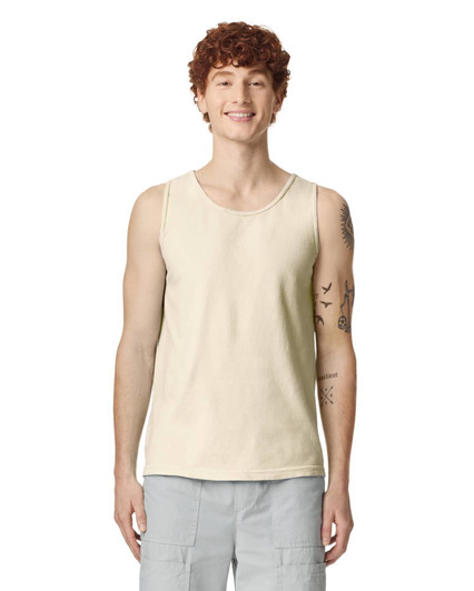 A light cream tank top displayed on a model, featuring a logo on the front.