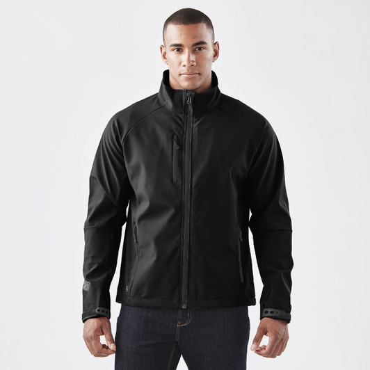 A black ultra-light shell jacket with a zip front and side pockets, featuring a logo on the sleeve.