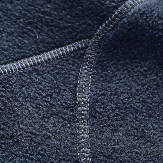 A close-up of a navy blue polar fleece jacket showcasing the textured fabric and detailed stitching.