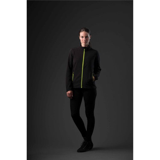 A women's black softshell jacket with bright green zippers, featuring a sleek design and a logo.