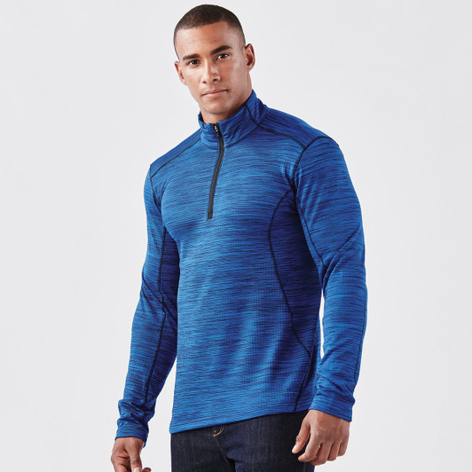 A men's base thermal 1/4 zip jumper in a vibrant blue colour, featuring a high collar and long sleeves.