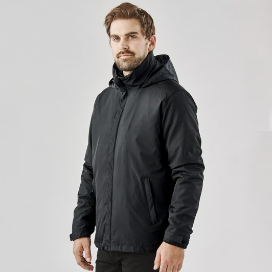 A black men's jacket with a hood, featuring a sleek design and pockets on either side. It has a logo on it.