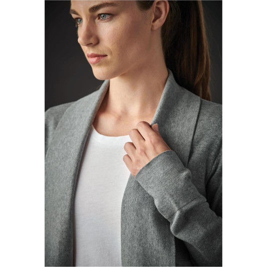 A grey women's cardigan features an open front and long sleeves, worn over a white top. The model has a neutral expression.