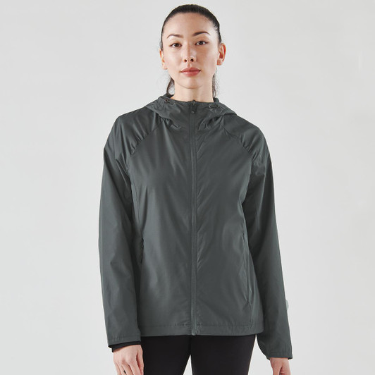A women's wind jacket in dark grey with a hood and a logo, featuring a lightweight design and long sleeves.