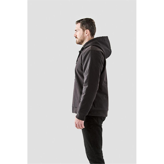 A men's hoodie in charcoal grey, featuring a hood and a logo, shown from the side on a model.