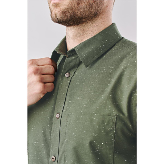 A close-up of a men's button-up shirt in olive green with a textured finish and a collar, featuring a small logo.