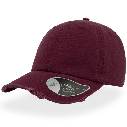 A maroon cap with a distressed design and a mid visor, featuring a logo sticker on the brim.