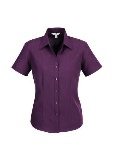 A short sleeve button-up shirt in a deep purple colour, featuring a collar and front buttons. It has a logo.