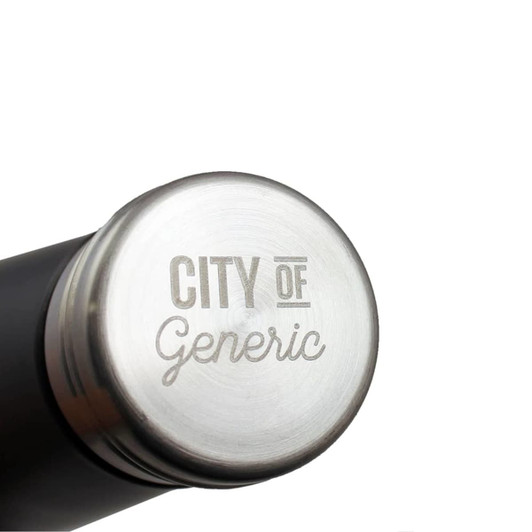 A drink bottle with a sleek stainless steel finish and a dark exterior. It features a logo on the cap.