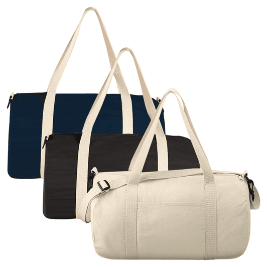 Three Cotton 18 Barrel Duffel bags in cream, navy, and black, featuring shoulder straps and a side handle.