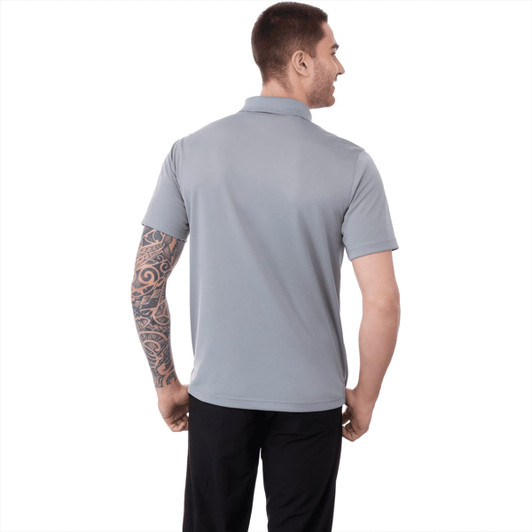 A grey short sleeve polo shirt with a collar, featuring a logo on the front. The model is viewed from the back.