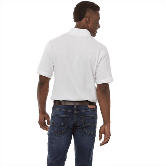 A man wearing a white short sleeve polo shirt, viewed from the back, paired with dark jeans. The shirt has a logo.