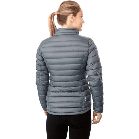 A women's puffer jacket in grey, featuring a fitted design and a high collar. It has a logo on the sleeve.