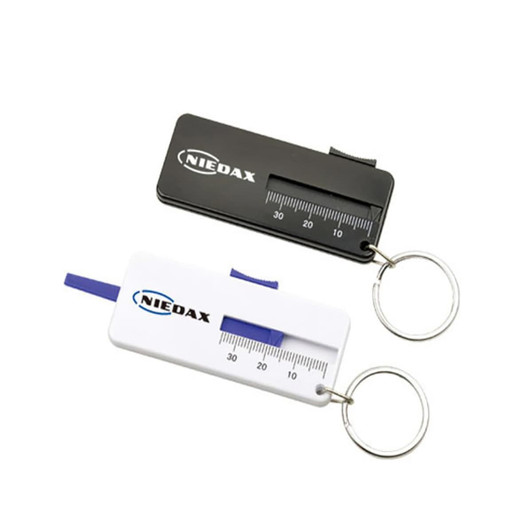 A tyre gauge keyring in black and white, featuring a ruler and a keyring attachment.