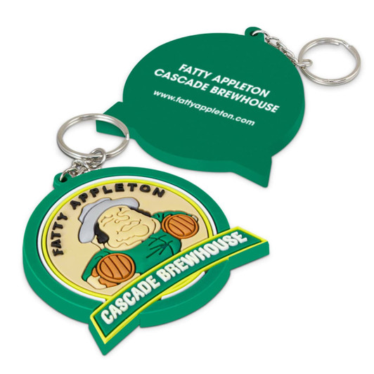 A large green PVC key ring with a moulded design featuring a character and a logo on one side.