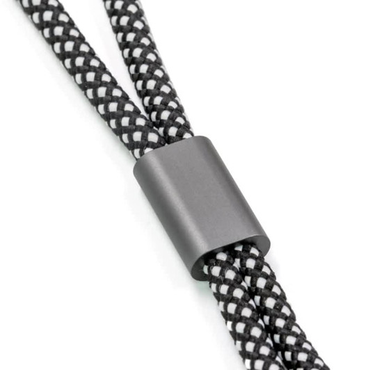A black and white braided wristband strap with a matte black connector.