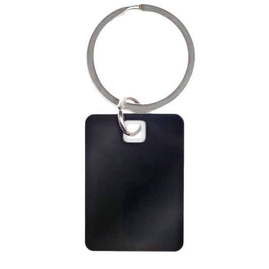 A rectangle stainless steel keytag with a smooth black surface, attached to a metal keyring.