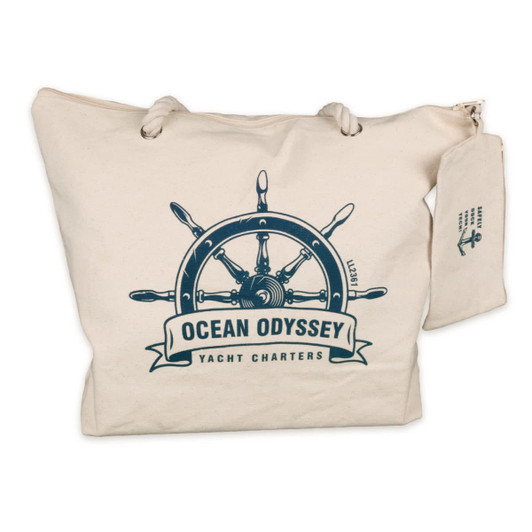 A beige canvas tote bag featuring a nautical steering wheel design and a small matching pouch.