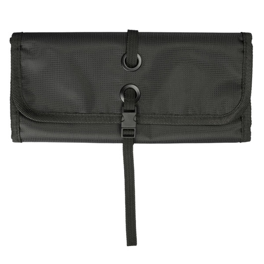 A dark green toiletry bag organizer features a roll-up design with two circular fasteners and a secure strap closure.