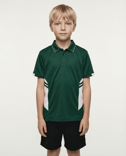 A green polo shirt with white accents, featuring a logo, worn by a child standing against a plain background.
