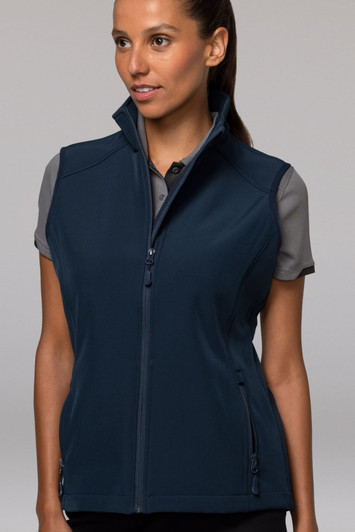 A navy vest with a high collar and zipped pockets, worn over a short-sleeved top.