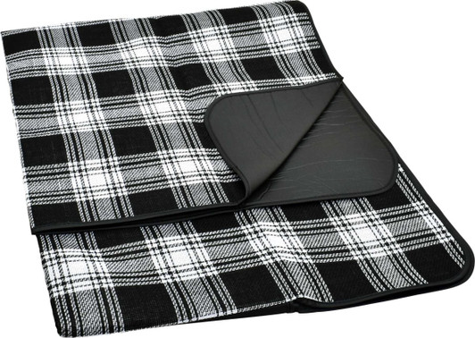 A black and white checked picnic rug with a smooth backing, featuring an integrated fold for easy storage.