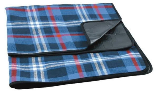 A blue and red checkered picnic rug with a black backing, featuring a fold-over edge and a logo.
