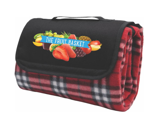A red check picnic rug with a black flap and a logo of assorted fruits on the front.