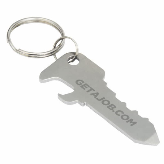 A drink bottle opener in the shape of a key, featuring a metallic silver finish and attached to a keyring.