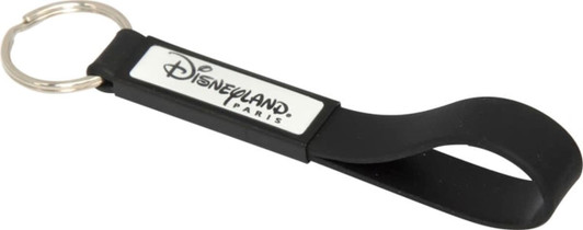 A black silicone keyring with a loop design and a rectangular area for a logo or branding.