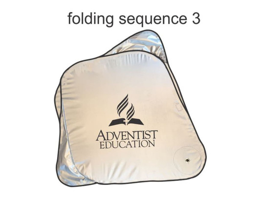 A silver sunshade with a black logo, featuring a compact, foldable design for easy storage.