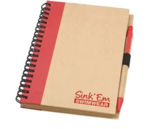 A notepad with a red and natural beige cover, featuring a black spiral binding and a red pen attached.