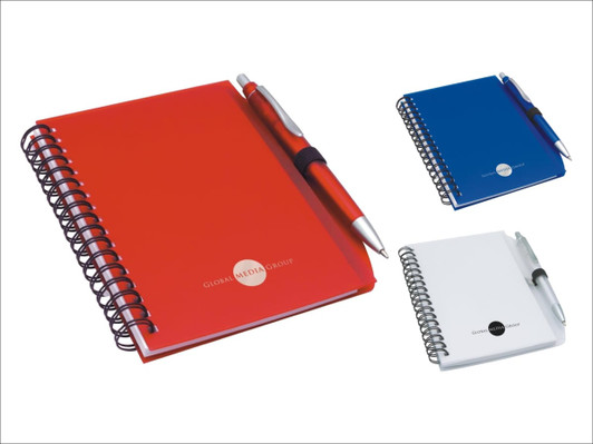 A red notepad with a pen, spiral-bound, alongside blue and white variants, featuring a logo.