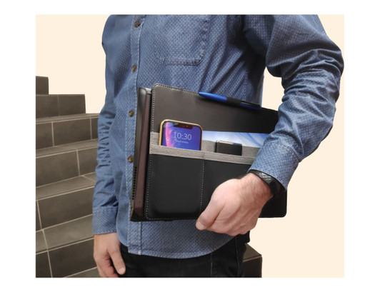 A black laptop bag is held by a person, featuring compartments for a phone, pen, and tablet. The bag has a logo.