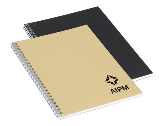 A spiral-bound A5 notebook in beige and black, featuring a logo on the front cover.