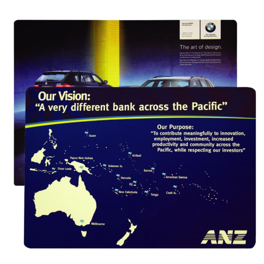 A counter mat featuring a blue background with a map of the Pacific and vehicle images. It includes a logo.