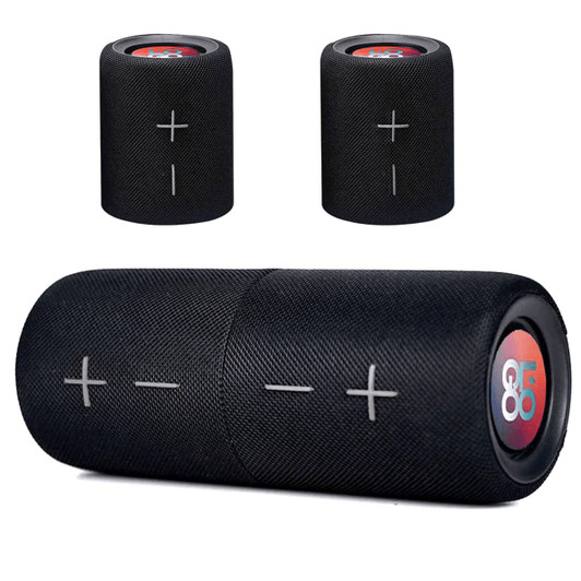 A black Breakaway Bluetooth speaker with volume controls, featuring a discreet logo. Two smaller speakers are also visible.