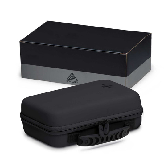 A black first aid kit with a sturdy case and zipper, placed beside a rectangular grey box featuring a logo.