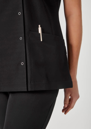 A black women's jacket featuring a side pocket with a pen holder. The fabric appears soft and fitted.