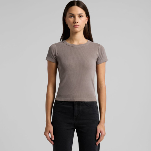 A fitted t-shirt in a faded brown colour with short sleeves, displayed on a model against a neutral background.