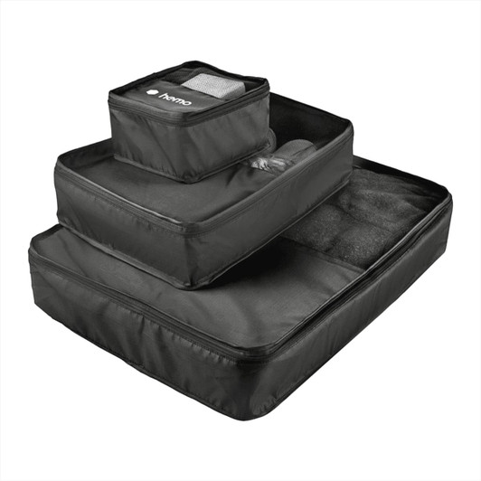 A set of three black packing cubes with mesh and solid compartments, featuring a logo on the smallest cube.
