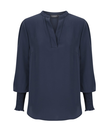A navy blue long sleeve top with a relaxed fit and gathered detailing at the cuffs. It features a partial collar.