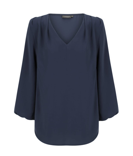 A navy blue v-neck popover shirt with three-quarter sleeves and a soft texture. It features subtle pleating details.